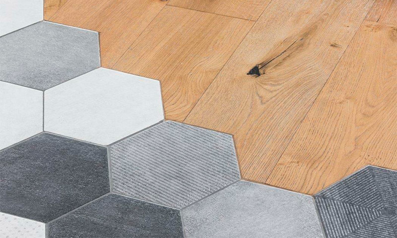 The design of the junction of tiles and laminate